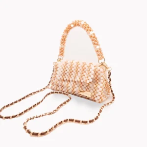 BOLSA PEQUEÑA DE CRISTALES BLANCO LECHOSO Y PERLA COLOR DORADO