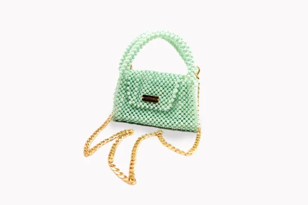 BOLSA MEDIANA DE CRISTALES VERDE AQUA TORNAZOL Y CON CRISTALES DE FORMA DE PERLA COLOR VERDE AQUA