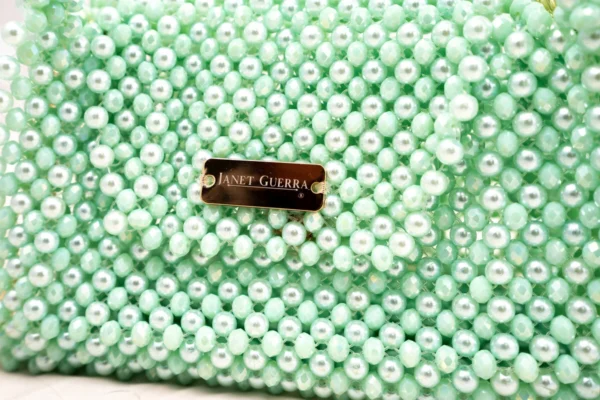 BOLSA MEDIANA DE CRISTALES VERDE AQUA TORNAZOL Y CON CRISTALES DE FORMA DE PERLA COLOR VERDE AQUA