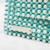 BOLSA MEDIANA DE CRISTALES AQUA MATE Y PERLAS COLOR VERDE MENTA CON AZA DE LOS MISMOS COLORES
