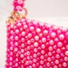 BOLSA MEDIANA CON CRISTALES TRANSPARENTES FUCSIA TORNASOL