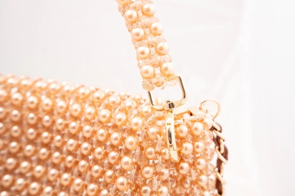 BOLSA  GRANDE CRISTALS BEIGE Y CAFÉ COBRE CON AZA CORTA DE LOS MISMOS TONOS