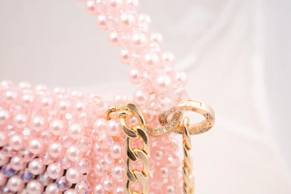 BOLSA GRANDE CON CRISTALES ROSA BABY TRANSPARENTE Y PERLA ROSA BABY