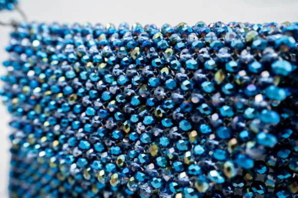 BOLSA GRANDE CON CRISTALES AZUL PAVO TONASOL Y VERDE TORNASOL