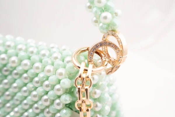 BOLSA GRANDE DE CRISTALES COLOR VERDE MENTA TORNASOSL CON PERLAS VERE MENTA